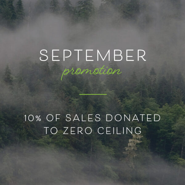 Text overlay on image: "September promotion: 10% of sales donated to Zero Ceiling" displayed against a foggy, forested background featuring our Tree-Free Business Cards.